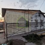 Фото. Утепление и отделка дома фасадными панелями, ул. Коммунаров, г. Волгоград.