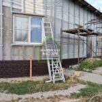 Фото. Утепление и отделка дома фасадными панелями, ул. Коммунаров, г. Волгоград.