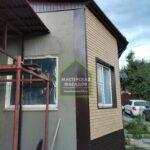 Фото. Утепление и отделка дома фасадными панелями, ул. Коммунаров, г. Волгоград.